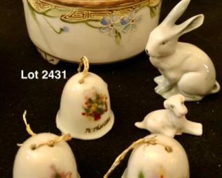 Lot 2431. $28.00 9 pc lot: Vintage Framed Doily, Ceramic Trivet, hand-painted Nippon trinket dish with fork, 3 mini Christmas bells, 2 small ceramic animals, 1 silver tone wire basket