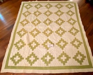 Lot 2433. $45.00. A vintage quilt/throw has some small stains that need some work, but structurally in great shape. 78"L x 64" w