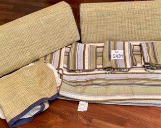 Lot 2434. $135.00. Day bed set includes: 2 grass bolsters, day bed quilt, 3 shams, and 1 daybed custom skirt with navy lining and grasscloth-ish. Later add: 2 additional matching day bed skirts (to quilt), 2 regular pillow case and 2 quilted pillow shams.