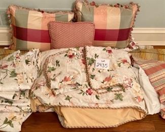 Lot 2435. $175.00. Such a good deal! Large Custom Bedding Set (with window treatments). 4 roman shades or panels (can't tell on 2 of them), window valance, 2 plaid pillows with pompoms, 1 throw pillow, 1 full duvet with insert (reverse to butter yellow), 1 full bedskirt, 2 custom pillows.