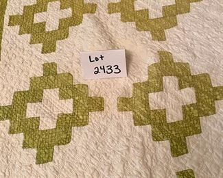 Lot 2433. $45.00. A vintage quilt/throw has some small stains that need some work, but structurally in great shape. 78"L x 64" w