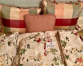 Lot 2435. $175.00. Such a good deal! Large Custom Bedding Set (with window treatments). 4 roman shades or panels (can't tell on 2 of them), window valance, 2 plaid pillows with pompoms, 1 throw pillow, 1 full duvet with insert (reverse to butter yellow), 1 full bedskirt, 2 custom pillows.