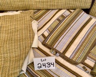 Lot 2434. $135.00. Day bed set includes: 2 grass bolsters, day bed quilt, 3 shams, and 1 daybed custom skirt with navy lining and grasscloth-ish. Later add: 2 additional matching day bed skirts (to quilt), 2 regular pillow case and 2 quilted pillow shams.