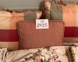 Lot 2435. $175.00. Such a good deal! Large Custom Bedding Set (with window treatments). 4 roman shades or panels (can't tell on 2 of them), window valance, 2 plaid pillows with pompoms, 1 throw pillow, 1 full duvet with insert (reverse to butter yellow), 1 full bedskirt, 2 custom pillows.