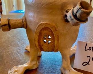 Lot 2441. $80.00. 2 Artist Made Studio Pottery Sculptures. One is an interesting head, the other is a surrealist house, with a detached top. Add some interest and whimsy to your home! The Head is 9" tall.