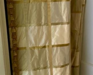 Lot 2442. $450.00. Custom-made and absolutely gorgeous silk fine drapery, 4 panels. Gold plaid with tassels and adornments. 87" L x 26" gathered at the top. These draperies can be reworked, but the silk fabric is exquisite.