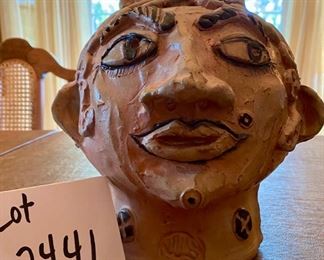 Lot 2441. $80.00. 2 Artist Made Studio Pottery Sculptures. One is an interesting head, the other is a surrealist house, with a detached top. Add some interest and whimsy to your home! The Head is 9" tall.