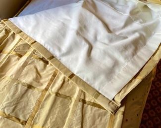 Lot 2442. $450.00. Custom-made and absolutely gorgeous silk fine drapery, 4 panels. Gold plaid with tassels and adornments. 87" L x 26" gathered at the top. These draperies can be reworked, but the silk fabric is exquisite.