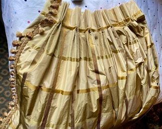 Lot 2442. $450.00. Custom-made and absolutely gorgeous silk fine drapery, 4 panels. Gold plaid with tassels and adornments. 87" L x 26" gathered at the top. These draperies can be reworked, but the silk fabric is exquisite.
