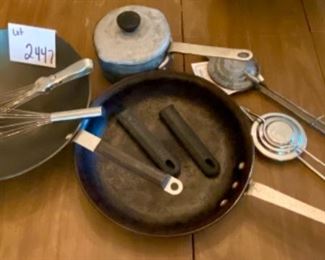 Lot 2447. $38.00. National Sanitation Foundation (NSF) Aluminum Commercial Cookware: Wok, Lidded Sauce Pan, Sautee Pan (needs a good scrubbing), a whisk, and a whisk/spatula, 2 cool handles, and 2 sandwich toasters (tonka toaster and nutbrown)! "Sautee: 12.75". wok 13". saucepan: 6.5 (1.5 qt)" A grilled cheese sandwich cooked over an open fire in one of the toasters above is indescribably delicious.