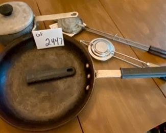 Lot 2447. $38.00. National Sanitation Foundation (NSF) Aluminum Commercial Cookware: Wok looks new, Lidded Sauce Pan, Fry Pan (needs a good scrubbing), a whisk, and a whisk/spatula, 2 cool handles, and 2 sandwich toasters (tonka toaster and nutbrown)! "Sautee: 12.75". wok 13". saucepan: 6.5 (1.5 qt)" A grilled cheese sandwich cooked over an open fire in one of the toasters above is indescribably delicious.