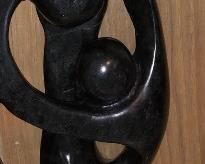 Lot 2170, $35.00. Mother, Father & Child black soapstone carving abstract from Kenya. 9" tall. Sorry for the awful picture, will rectify that on Wednesday!