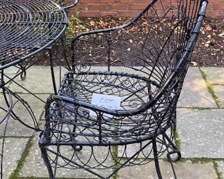 Lot 2299. Sunday Discounted Price: $550.00 FIRM. Was $795.00. Vintage Wire Outdoor Dining Set. Richard Porton Inc English Wire Table and 4 Robert Allen Furniture Co Wire Dining Chairs. Chairs have cool details (owner purchased set for a fortune from an Antique Shop). All pieces are in great condition. The chairs can definitely use a small cushion. A well crafted set, perfect for your garden party! Table: 40" dia, 28.5"h. Chairs: 35" back, 19" wide, 17" deep, 18: h