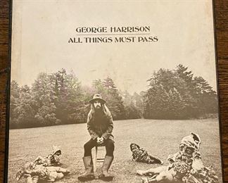 Lot 2500 $300.00 The Beatles 13 LP Collection includes All Things Must Pass by George Harrison. This is a significant collection of early Beatles, Sgt Peppers, Revolver and Rubber Soul.