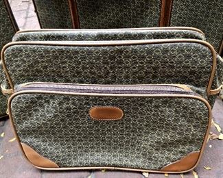 Lot 2324. $80.00 for the set! Vintage Wings Luggage Set. 2 suitcases and 1 carry on bag. The carry on bag is in WONDERFUL condition, the two suitcases need to be cleaned well on the outside, would probably do well with some leather conditioning too!