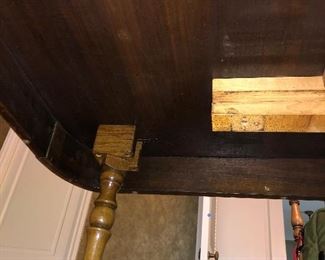 Lot 2266 $595.00. This is how the extra support legs are connected. Additionally while I was down here to take this picture, the homeowner noted that there was a signature somewhere on this piece from the maker, but she couldn't remember where it was and I couldn't find it!