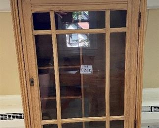 Lot 2358. $85.00. Glass door wall cabinet- very vintage- light stained. 17.5"w x 33.5"t x 6"d