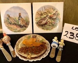 Lot 2382. $18.00. Continuing the fall theme! 2 Pheasant Trivets (really these are tiles), 4 fall spreaders, 1 vintage pressed flower trivet in lucite or resin and a doily