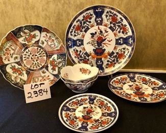Lot 2384. $250.00. Possibly old Imari ware Japan Serving Platters and Bowls: 4 Platters/Plates (8.25" dia, 10.25" dia, 12" dia, 14" dia). The 12" dia is a scalloped edge platter/charger with a little different pattern but coordinates well. 2 vegetable bowls (7" dia each).