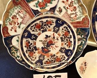 Lot 2384. $250.00. Possibly old Imari ware Japan Serving Platters and Bowls: 4 Platters/Plates (8.25" dia, 10.25" dia, 12" dia, 14" dia). The 12" dia is a scalloped edge platter/charger with a little different pattern but coordinates well. 2 vegetable bowls (7" dia each).