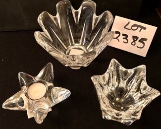 Lot 2385. $70.00. 3 Orrefors pieces with boxes. All in excellent condition. Large vase/bowl: 4.5"t x 6.75"w at top. Med: "Belle Vase" 4 1/8" w x 4 1/2" h. Star votive holder: 5.25"w x 2.25" h