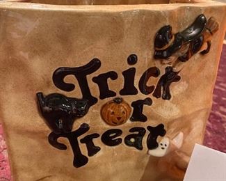 Lot 2371. $20.00. It's Fall, Y'all! 3 pc Halloween Lot. Ghost fig ceramic (4"dia x 5"t). Trick or Treat Bag ceramic (7"x5.5"x7"t). 12"d Jack-o-lantern. 10" tall (a light can go in the center)