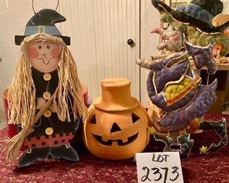 Lot 2373. $25.00. Jack-o-lantern, metal witch, wooden witch