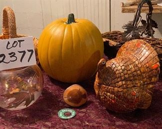 Lot 2377, $38.00. 1) Resin Pumpkin- great centerpiece, 2) Turkey cover gravy dish (adorable), 3) Grass Rose bowl w/leaf motif, 4) New Zealand Bottle Stopper made from a tree knot. 5) 2 Baskets that would be great for Fall decor!