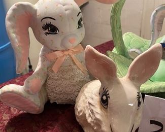 Lot 2378, $50.00. Big lot of Easter: cabbage basket w/ bunny; Brown Bunny; White cotton ball holder bunny; Bunny bank 9" tall; small bunny bank; tiny bunny
