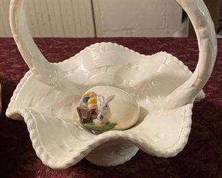 Lot 2380, $40.00. 8 Easter items: White ceramic basket; 2 yellow ducks; leaf-shaped bowl w/ 2 marbelized ceramic eggs; Large ceramic basket & a decorated egg