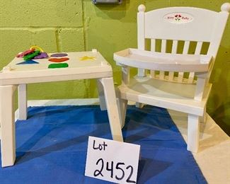 Lot 2452. $35.00. Vintage American Girl Doll Bitty Baby High Chair and Activity Table, with blocks and teething ring. My youngest daughter had one of the first Bitty Baby Dolls, as my sister in law worked for the Pleasant Company just over the border in Wisconsin. That doll went EVERYWHERE with her, clearly the best overpriced Pre-American Girl item we ever bought!
