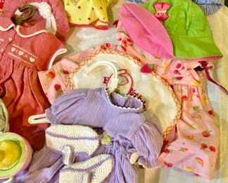 Lot 2453. $95.00. American Girl Doll Bitty Baby Lot of Outfits (7 outfits). Easter Set, Valentine, Birthday, Circus, Rain Gear, Swimsuit, Dress.