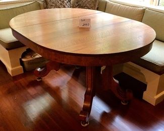 Lot 2497. $250.00. Kitchen Table (just the table, no chairs or cushions). Oak 4 leg table, 1 leaf Oval. 48"w x 58"l x 30"t. The leaf is 16.5"w.