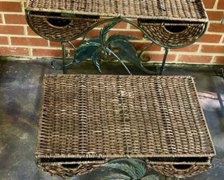 Lot 2498B: $90.00. each set of two. We have 2 sets of 2 tables. Vintage Wicker Nesting Tables: Wicker (has light wear, commensurate with age, , with wrought iron base with palm tree designs. Tables have 2 drawers and stack to nest. "Larger: 26""w x 16""d x 24""t & Smaller: 21""w x 14""d x 19""t"