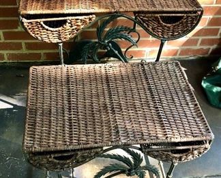 Lot 2498: $90.00. each set of two. We have 2 sets of 2 tables. Vintage Wicker Nesting Tables: Wicker (has light wear, commensurate with age, , with wrought iron base with palm tree designs. Tables have 2 drawers and stack to nest. "Larger: 26""w x 16""d x 24""t & Smaller: 21""w x 14""d x 19""t"