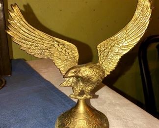 Lot 2463. $55.00. 3 vintage wall sconces (we have clear chimneys for these 3) oil lamps. 2 vintage amber glass handy oil lamp w/ reflector, hangs on the wall. And one brass eagle.