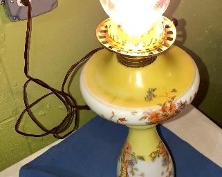 Lot 2462. $48.00. Vintage Table Lamp, Yellow, and White printed. Included sweet cranberry shade that we think would look lovely on this lamp! 19"tall to top of lamp (not a hurricane), x 7" wide
