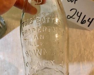 Lot 2464. $65.00. Vintage Bottles (8 pc) and vintage marbles. Lot Includes: Pike Dairy Cream Top with spoon bottle, 2 milk carafes, 1 green glass hinged bottle, 2 ball jars (1 with lid),