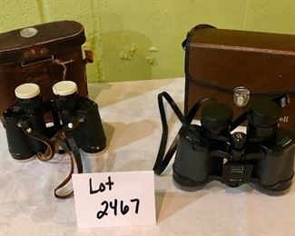 Lot 2467. $60.00. 1 pair of Bushnell Binoculars (Sportview) Insta Focus ST5890 and 1 pair of Binolux Universe No W6-91014 (case is damaged, but has a cool compass on it)