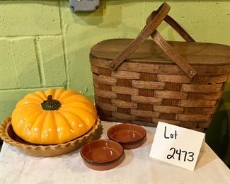Lot 2473. $38.00. Let's continue on this fall journey, shall we? 1 Woven Picnic Basket with lid (great shape, nice medium wood color, adorable covered pumpkin dish, and 2 ramekins Basket: 18"w x 12"d x 9"t