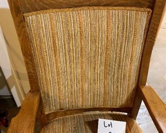 Lot 2477. $50.00. Interesting vintage Oak Rocker with striped upholstery. The wood details are incredible, but the fabric needs a good cleaning! Measures: 29"w x 41"t. seat: 19"d x 14"h
