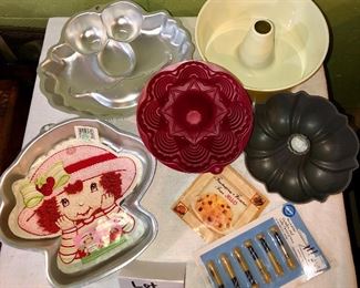 Lot 2485. $25.00. Strawberry Shortcake, Grover, Jello Mold, Angel Food Cake, Bundt Cake, Baseball Candles