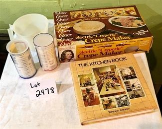 Lot 2478. $30.00. 2 Pampered Chef Measuring Cups (liquid and dry goods), The Kitchen Book, Vintage Crepe Maker (Oster Electric)