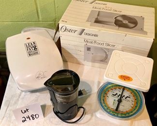 Lot 2480. $40.00. Small appliance lot. Oster Electric Meat/Food Slicer 34718, George Foreman Grilling Machine, Food Scale (Microweight), and MR. Coffee Grinder
