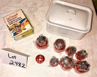 Lot 2482. $28.00. The cutest little set! Enamelware Covered Storage Dish, cute little vintage Le Canape Set (with book), and 8 suncraft (we are calling them cookie) cutters.