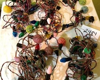 Lot 2484. $40.00. 4 vintage strands, 1 extra strand for blubs (we couldn't get it to turn on)