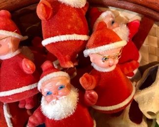 Lot 2487. $160.00. A huge lot of vintage Christmas. Includes a basket filled with vintage flocked Christmas light covers (a Radiant Decorative Light booklet), a Christmas Basket, 2 Gorham Christmas Dolls, one smaller Porcelain doll, 2 vintage stands of lights (1 has a few glass snowflakes).