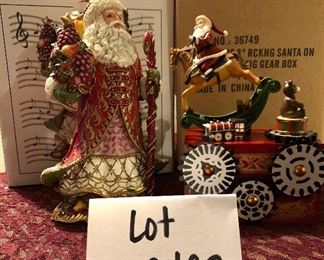 Lot 2493. $30.00. Fitz and Floyd Renaissance Santa Music Box (Deck the Hall) and Rocking Horse Santa Music Box (Roman Inc)