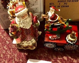 Lot 2493. $30.00. Fitz and Floyd Renaissance Santa Music Box (Deck the Hall) and Rocking Horse Santa Music Box (Roman Inc)