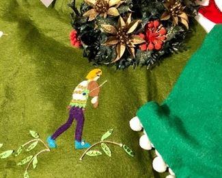 Lot 2496. $40.00. Vintage-Kitsch. Faux floral, 2 wax santas, 2 sequined ornaments, felted skirt, runner and toilet seat cover (hilarious), boxed ornament, gold basket.